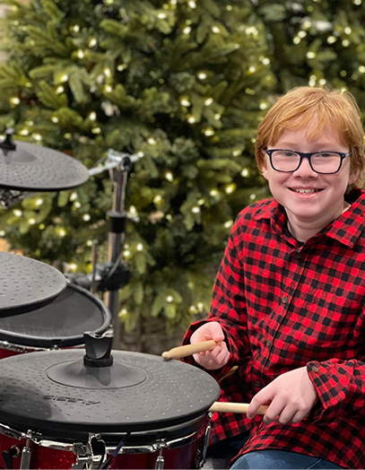 Caleb Music school recital drum lessons